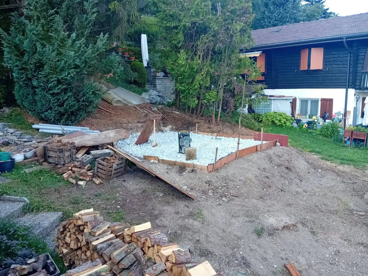 Terrassement et pose du lit de gravier